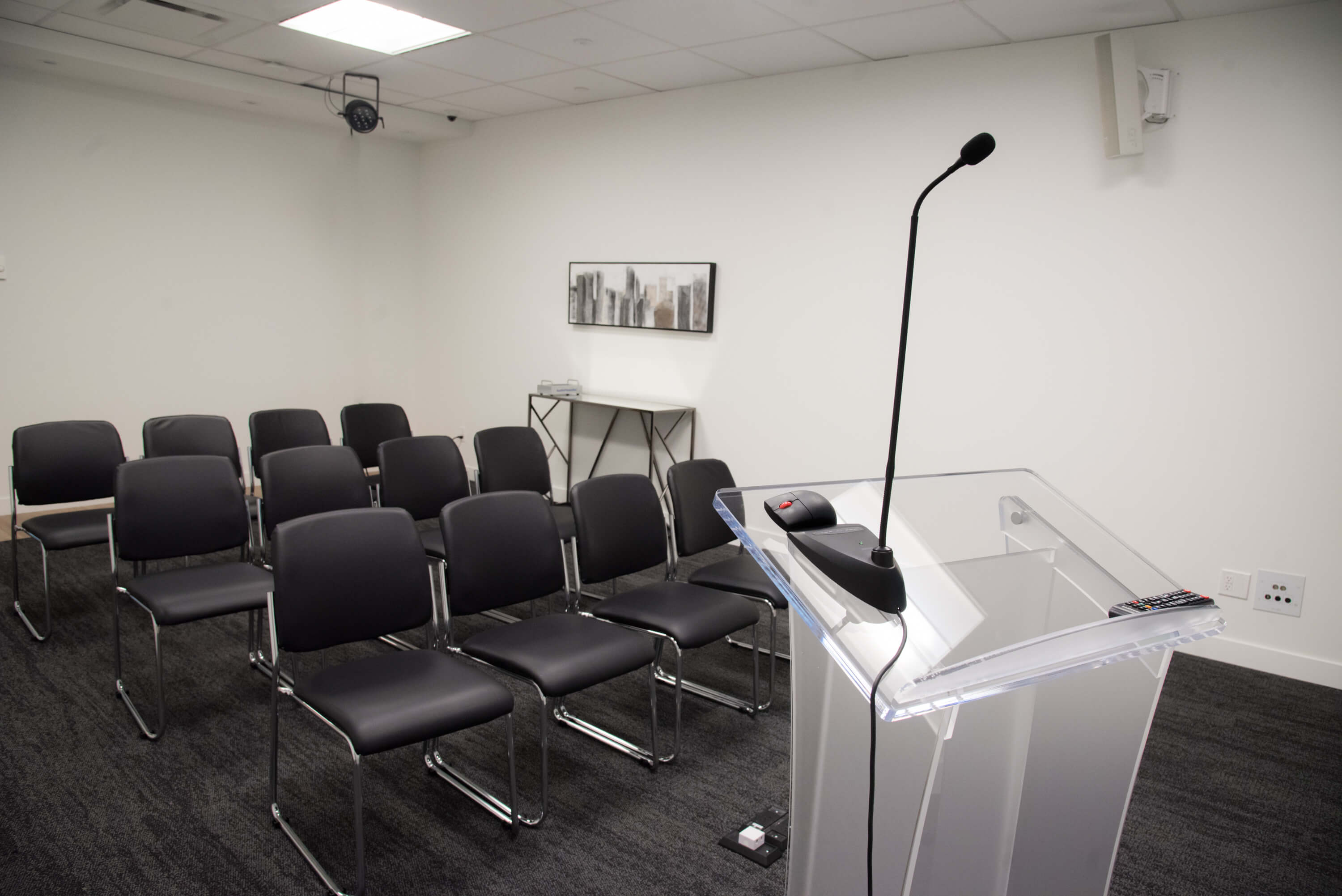 Calgary meeting room with a speaker podium